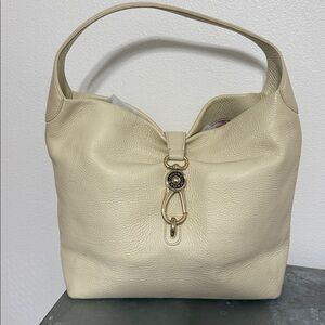 Dooney & Bourke Belvedere Logo Lock Shoulder Bag in Cream grain leather